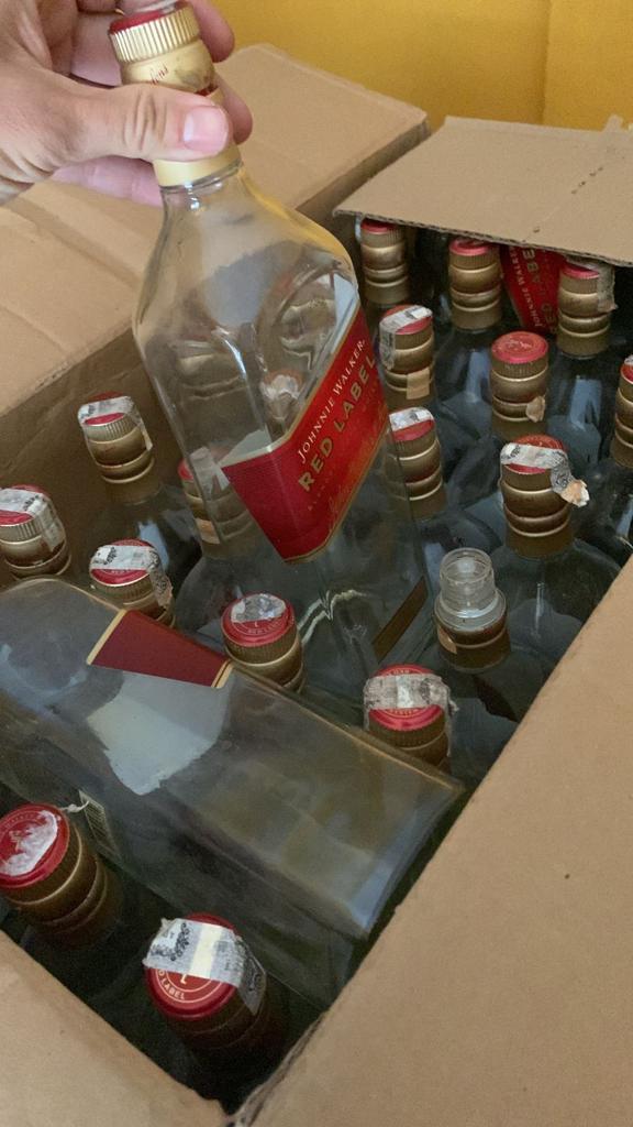 bebidas alcoólicas apreendidas em fábrica clandestina de Nova Iguaçu
