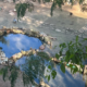 Lago artificial criado por morador do bairro Mutondo para evitar infiltração em casa