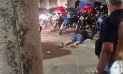 criminoso deitado no chão após ser atingido nas nádegas em tiroteio próximo ao Norte Shopping