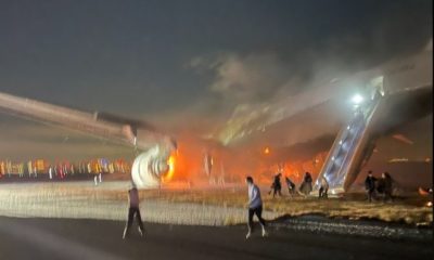 Avião pego fogo no Japão