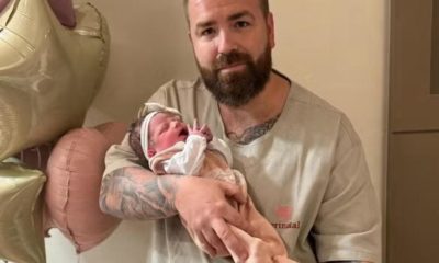 Leniel Borel com a filha Valentina e a tatuagem em homenagem ao filho Henry