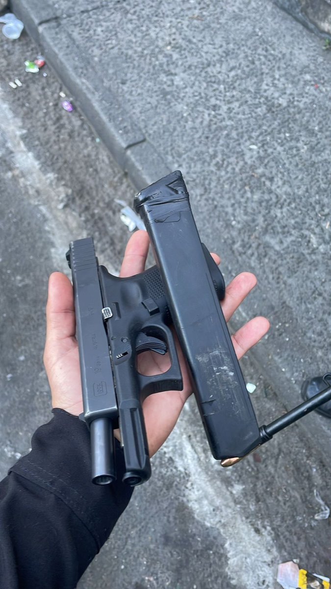 Arma de fogo apreendida na Cidade de Deus.