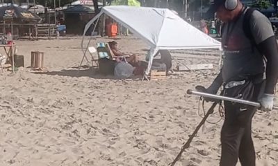 'Garimpeiro de Copa' procura por objetos de valora após show de Madonna, em Copacabana.