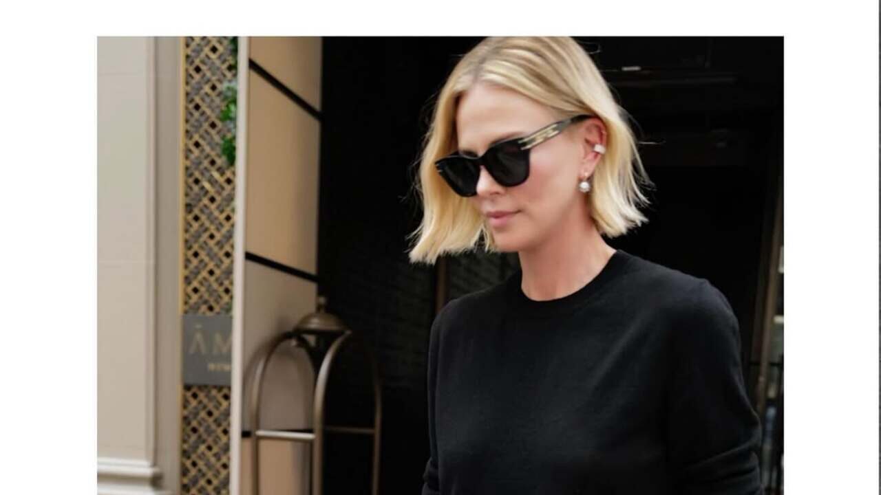 Você não vai acreditar no que Charlize Theron fez com suéter e botas em NY!