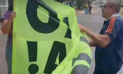 Confronto entre manifestantes e bolsonaristas em frente à casa de Bolsonaro