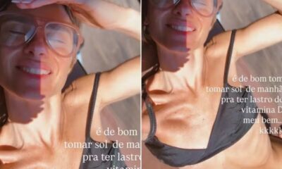 De biquini, Carolina Dieckmmann brinca ao tomar sol: “É de bom tom tomar sol de manhã”