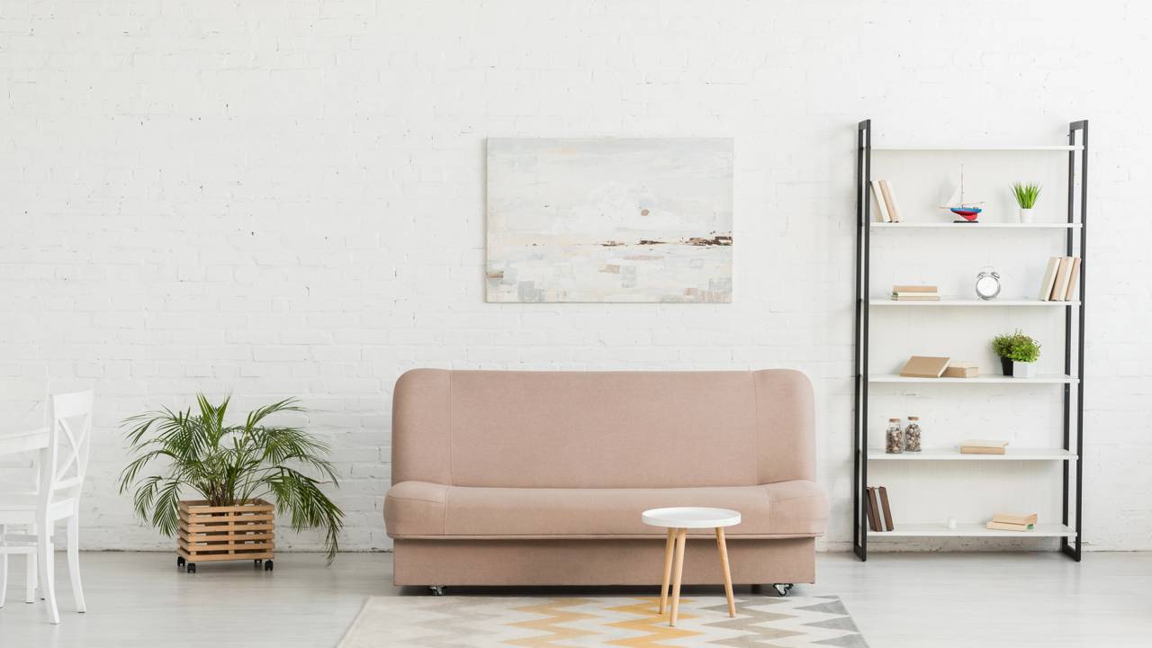 Coloquei móveis com bordas arredondadas e a sensação de relaxamento na sala