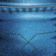 O que significam aqueles "botõezinhos" nos bolsos das calças jeans?