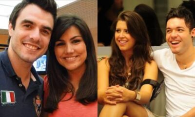 Dois casais sorrindo, um abraçado, o outro sentado lado a lado.