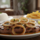 O truque que ninguém te contou para fazer o bife acebolado perfeito em 5 minutos