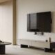 Adeus, painel de TV: a nova tendência mais barata, que aumenta o espaço da parede e deixa a sala mais bonita