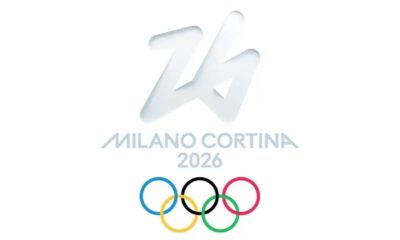 Logo dos Jogos Olímpicos de Inverno Milão Cortina 2026 com os anéis olímpicos.