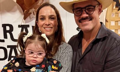 Juliano Cazarré, Letícia e a filha Maria Guilhermina, com a criança usando óculos.