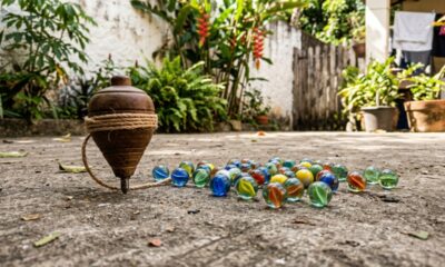 Jogos como pião e bolinha de gude faziam sucesso antes dos videogames e marcaram gerações