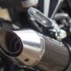 Moto pipocando na reduzida pode indicar falha escondida que afeta desempenho e aumenta desgaste