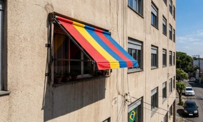 Morador coloca um toldo na janela para aliviar o calor, mas a mudança externa acaba virando briga no condomínio