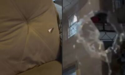 Sofá com rasgo e objeto branco, e imagem borrada de vidro quebrado.