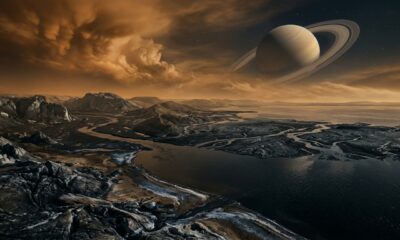 Titã, a maior lua de Saturno, possui rios, lagos e um ciclo hidrológico lento, assim como a Terra, mas cada gota é metano líquido e coberta por gelo