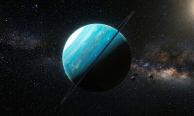 Por que Urano gira praticamente de lado em relação aos outros planetas?