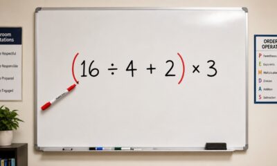 Quadro branco em sala de aula com a expressão “(16 ÷ 4 + 2) × 3”, parênteses em vermelho e um marcador apontando para eles
