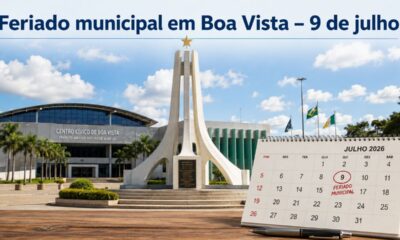 Vista do Centro Cívico de Boa Vista, em Roraima, com monumento da Praça do Centro Cívico em destaque e calendário aberto marcando 9 de julho de 2026 como feriado municipal.