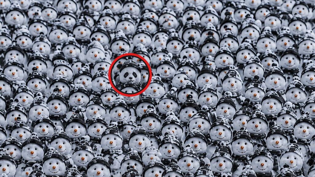 Imagem em close mostra centenas de bonecos de neve muito parecidos, alinhados lado a lado, enquanto um círculo vermelho destaca o panda escondido entre eles no centro da cena.