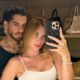 Virginia Fonseca e Zé Felipe tiram selfie em um closet luxuoso com bolsas de grife