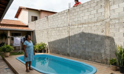 Vizinho constrói paredão de 4 metros para tapar piscina por vingança de festa até as 23h, perde ação por abuso de direito e paga R$ 1.200 por dia de atraso