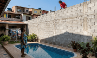 Vizinho constrói paredão de 4 metros para cobrir piscina com sombra por vingança de festa até as 23h, perde ação por abuso de direito e paga R$ 1.200 por dia de atraso