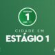 Banner verde com “Estágio 1” em círculo branco e “CIDADE EM ESTÁGIO 1” centralizado
