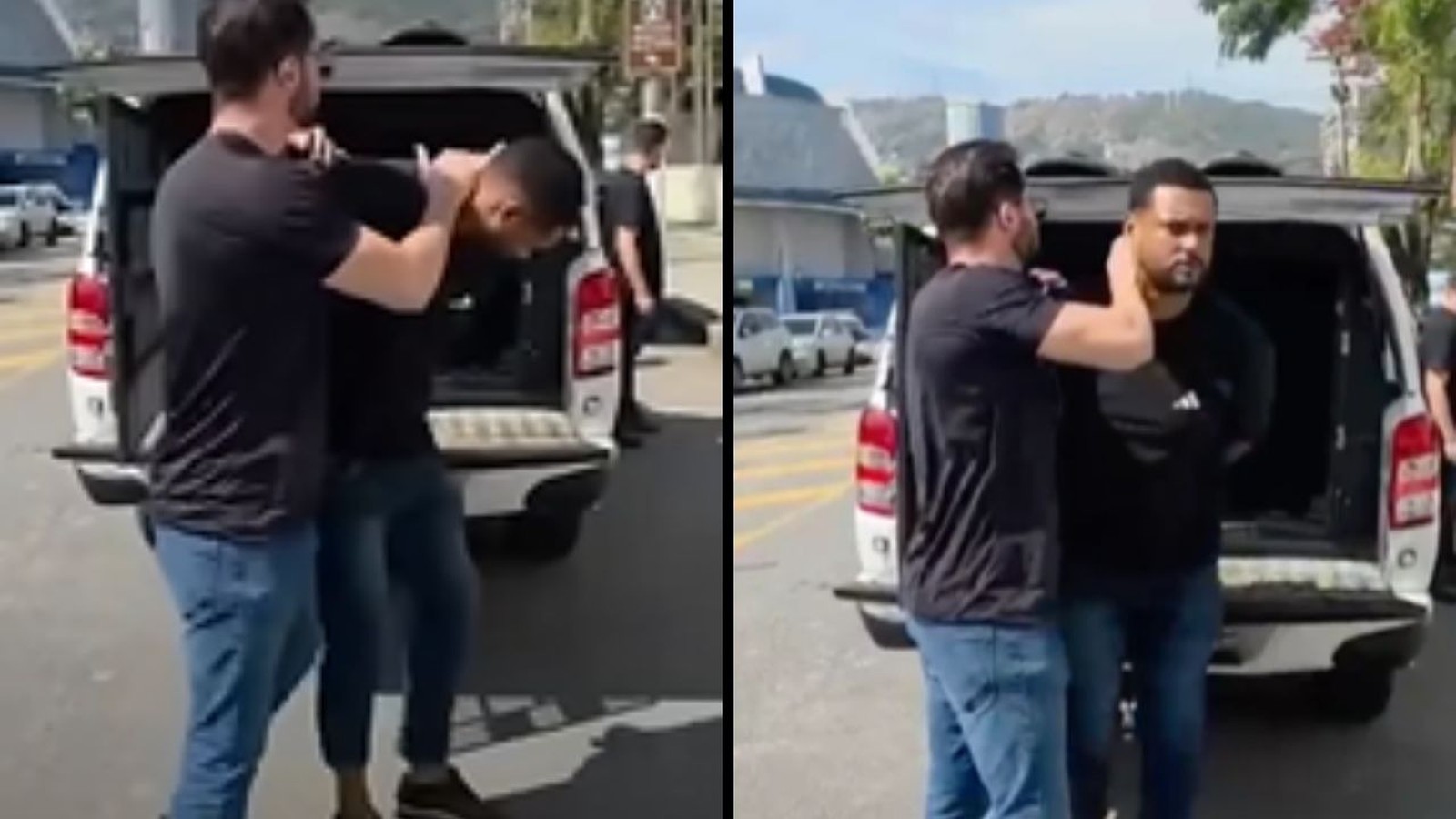 Homem detém outro homem ao lado de picape branca com porta-malas aberto na rua
