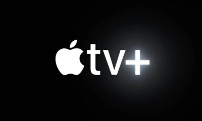 Logotipo branco da Apple TV+ em um fundo escuro com um brilho suave