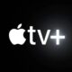 Logotipo branco da Apple TV+ em um fundo escuro com um brilho suave