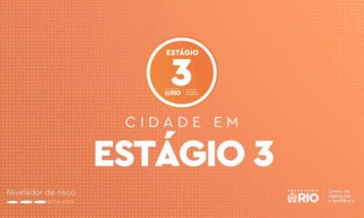 Graphic: Orange background. Text 'CIDADE EM ESTÁGIO 3', 'Nivelador de risco', and Prefeitura Rio logo