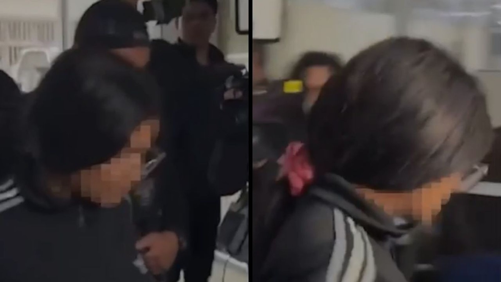 Mulher de cabelo escuro, rosto borrado, blusa preta com listras brancas, rosa na cabeça