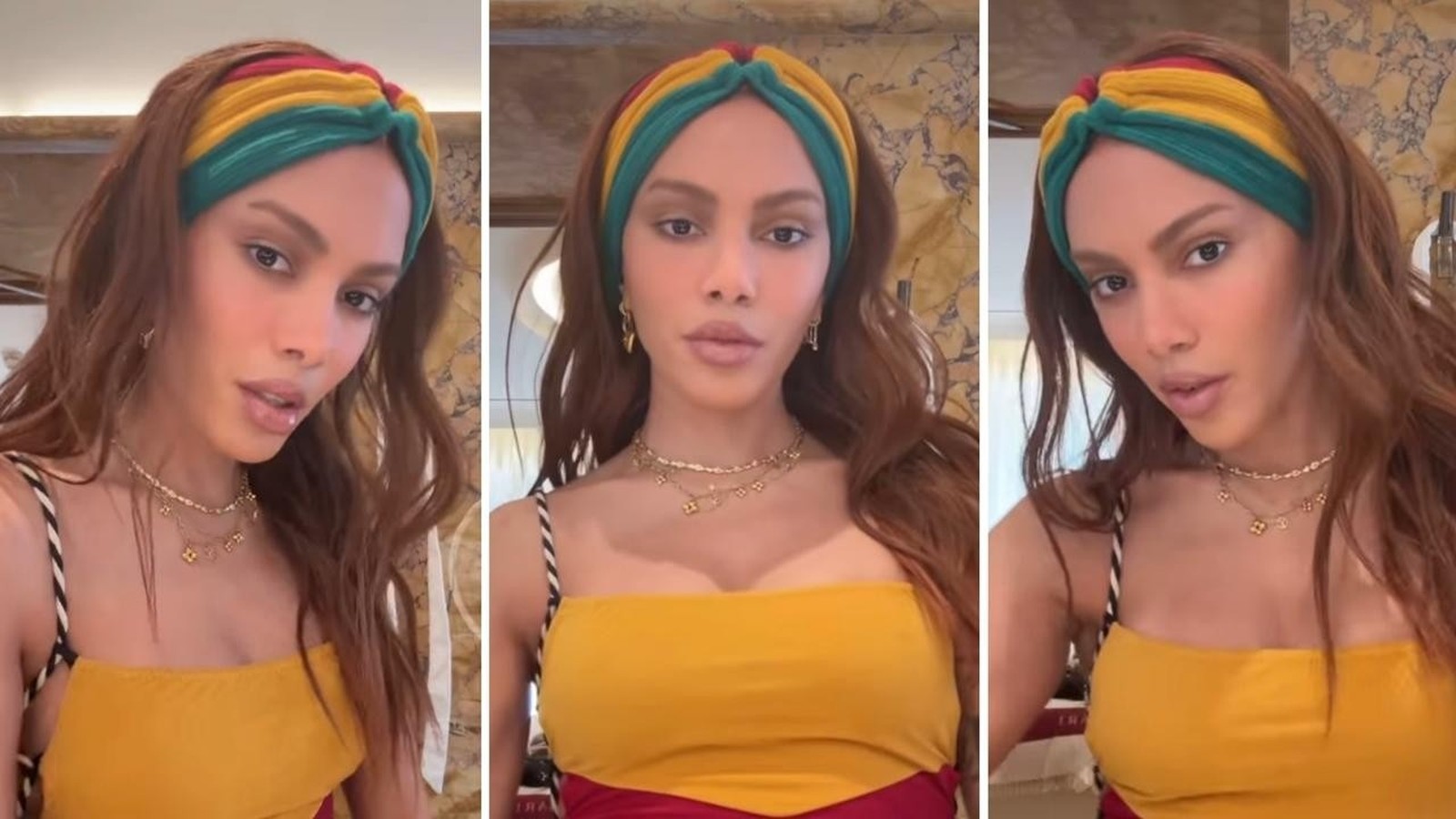 Mulher de cabelos castanhos longos, headband colorido, top amarelo e colares dourados