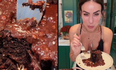 Chef Heaven Delhaye saboreia bolo de chocolate com ganache, ao lado da receita recém-preparada
