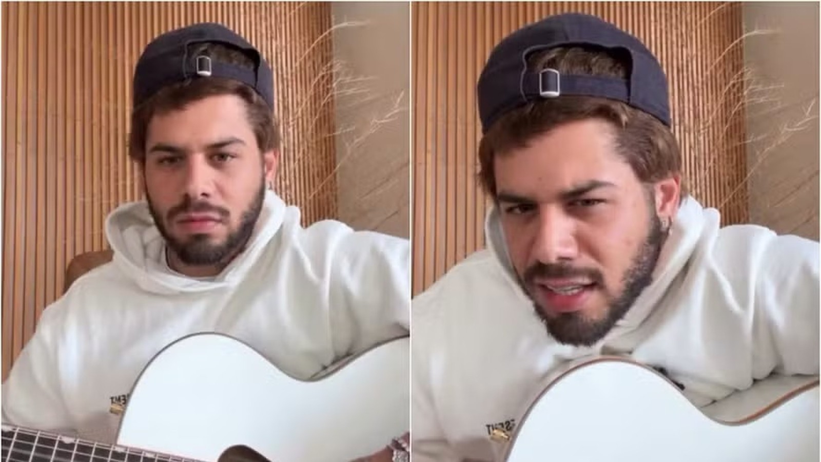 Zé Felipe, de boné e moletom branco, segura violão branco com fundo amadeirado