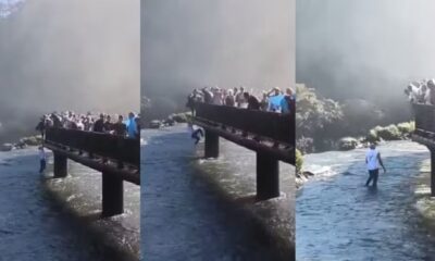 Homem pula passarela e entra nas águas das Cataratas, com multidão observando