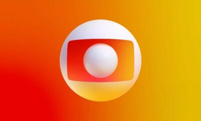 Logo da Globo com esfera branca sobre fundo degradê laranja e amarelo