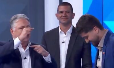 Anthony Garotinho gesticula, Douglas Ruas sorri e William Siri abaixa a cabeça contendo riso