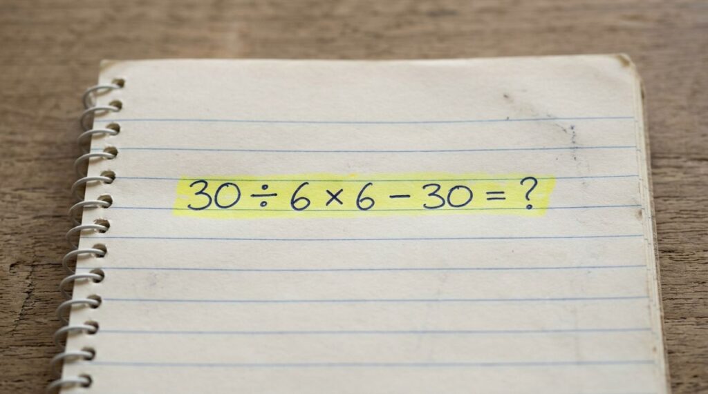Quatro números conhecidos formam um desafio que exige atenção: 30 ÷ 6 × 6 − 30