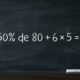 Quadro negro com a expressão matemática 50% de 80 + 6 × 5 e um ponto de interrogação.