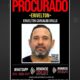 Cartaz "PROCURADO" com foto de Erivelton Carvalho Grillo e informações de contato do Disque Denúncia