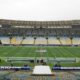 Estádio Maracanã com campo de futebol americano, logos NFL Rio Game, Ravens e Dallas Cowboys