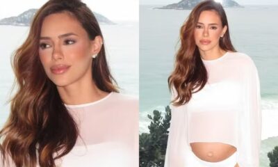 Bruna Biancardi grávida, cabelos castanhos, top branco, barriga aparente, fundo mar