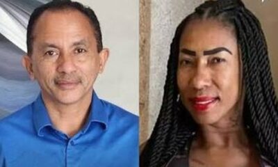 Homem de camisa azul e mulher de cabelo trançado, lado a lado, olhando para frente