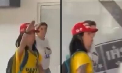 Duas imagens: mulher de camisa amarela, boné, mochila, fazendo saudação nazista. Fundo com letreiro 'IHS'