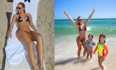 Virginia Fonseca na praia com dois filhos; um na espreguiçadeira, outro na água