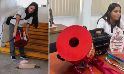 Jovem demonstra extintor acústico em fogo pequeno e exibe o aparelho com troféu 'Primer Lugar'